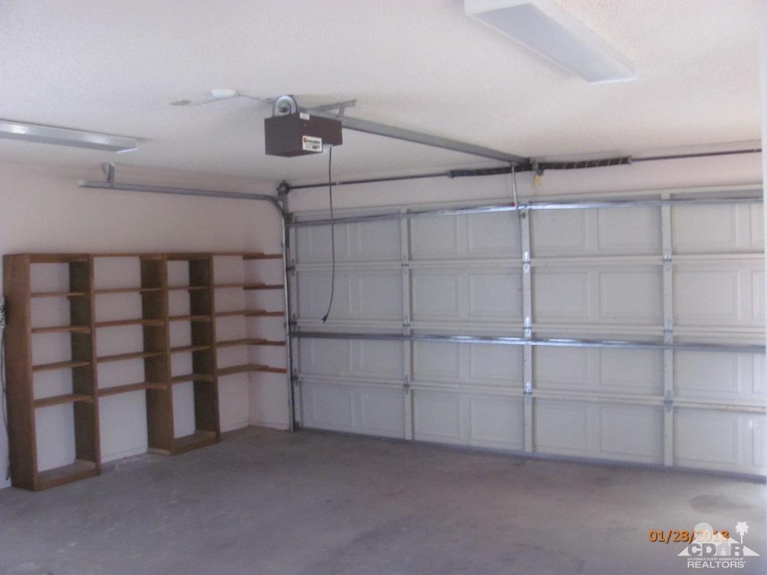 7078 Cascade Road Joshua Tree, CA 92252 - Photo 16 of 21 a view of a store room cabinets