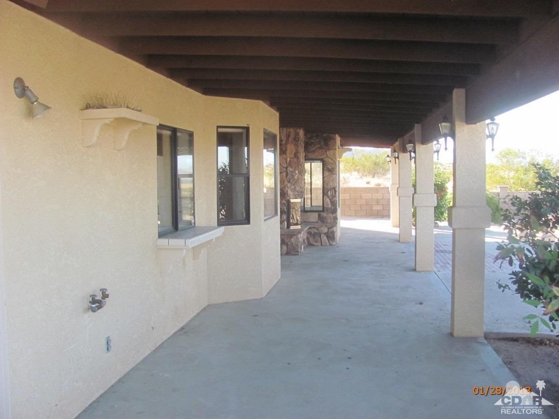 7078 Cascade Road Joshua Tree, CA 92252 - Photo 17 of 21 a view of a porch