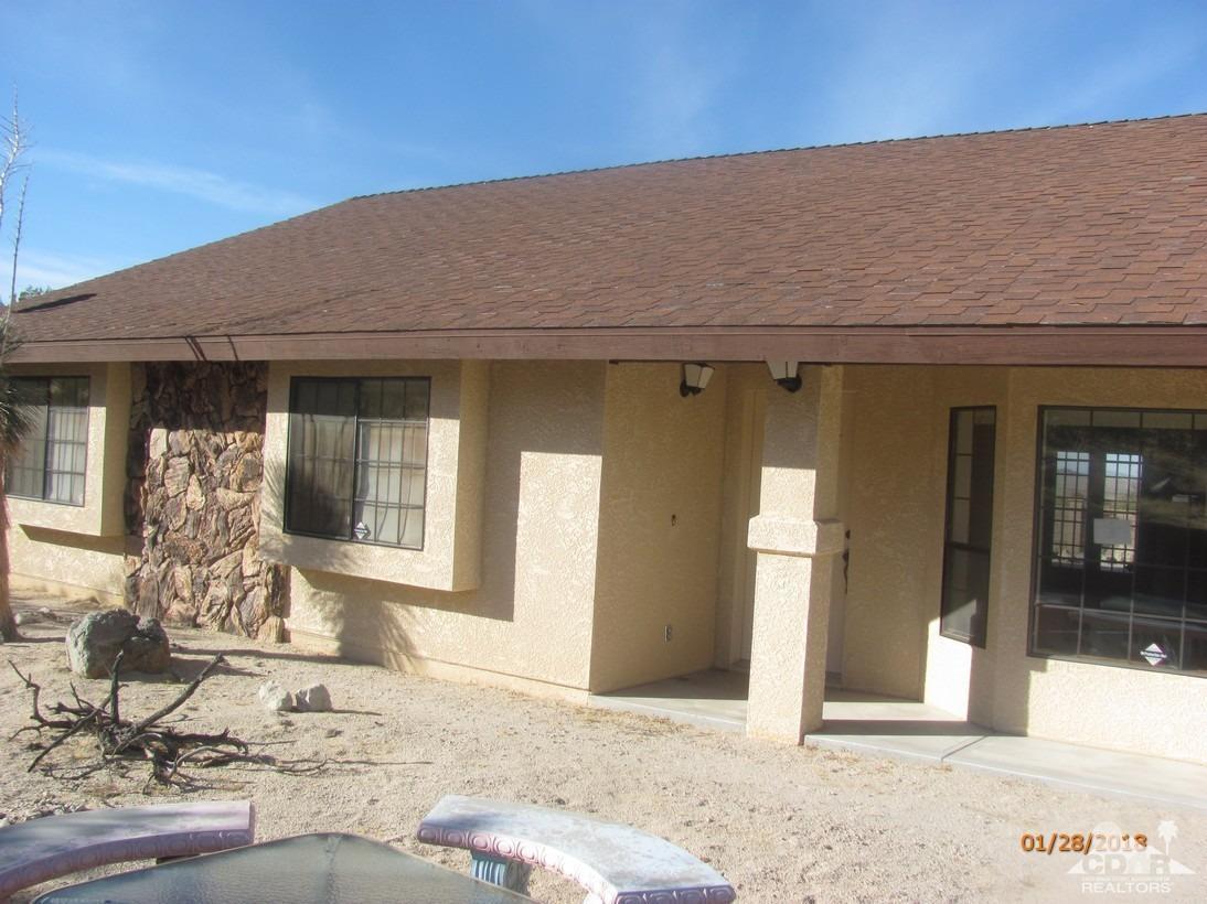 7078 Cascade Road Joshua Tree, CA 92252 - Photo 5 of 21 a front view of a house