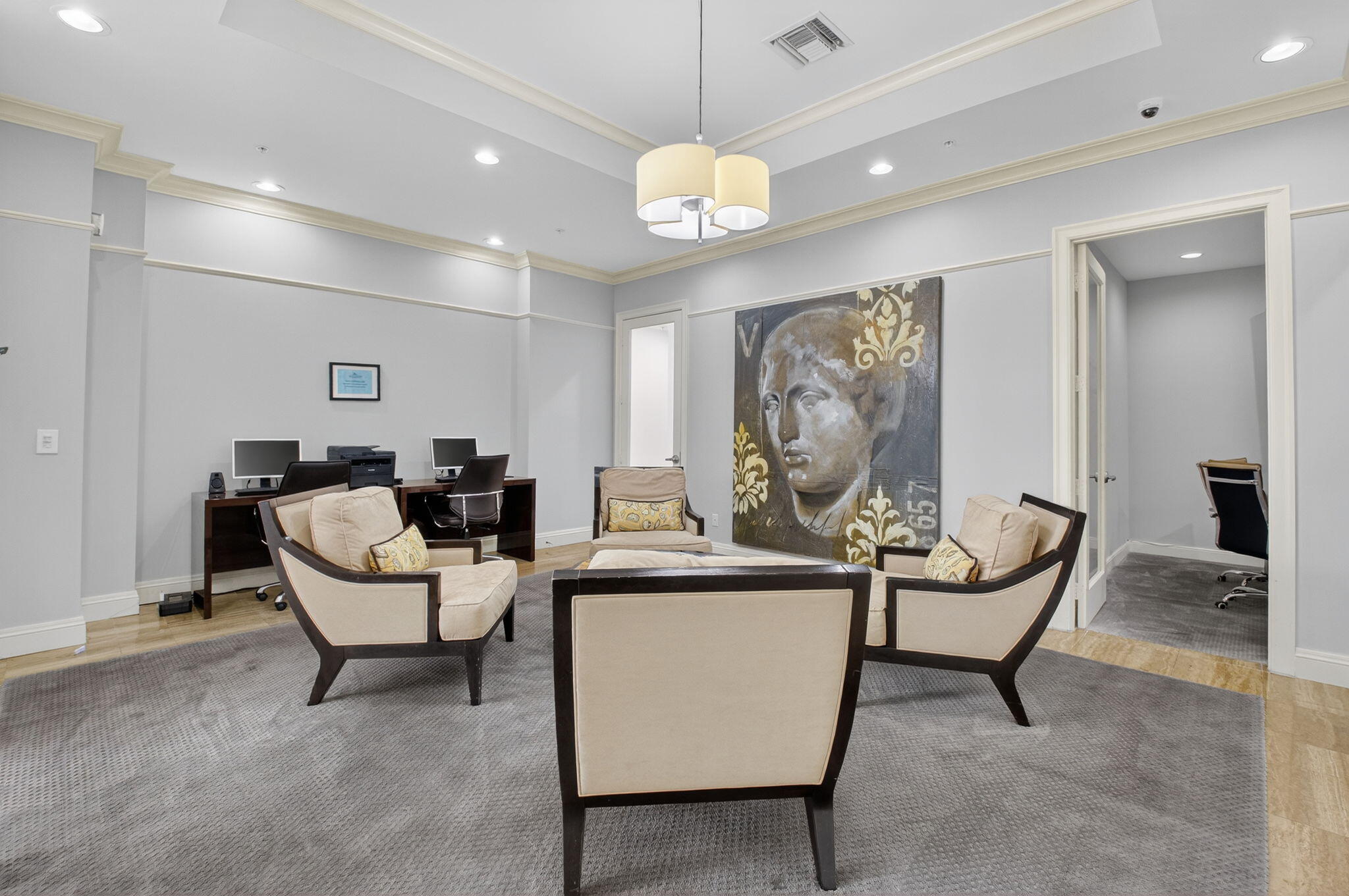 233 South Federal Highway, Unit 423 Boca Raton, FL 33432 - Photo 48 of 55 a living room with furniture a table and a chandelier