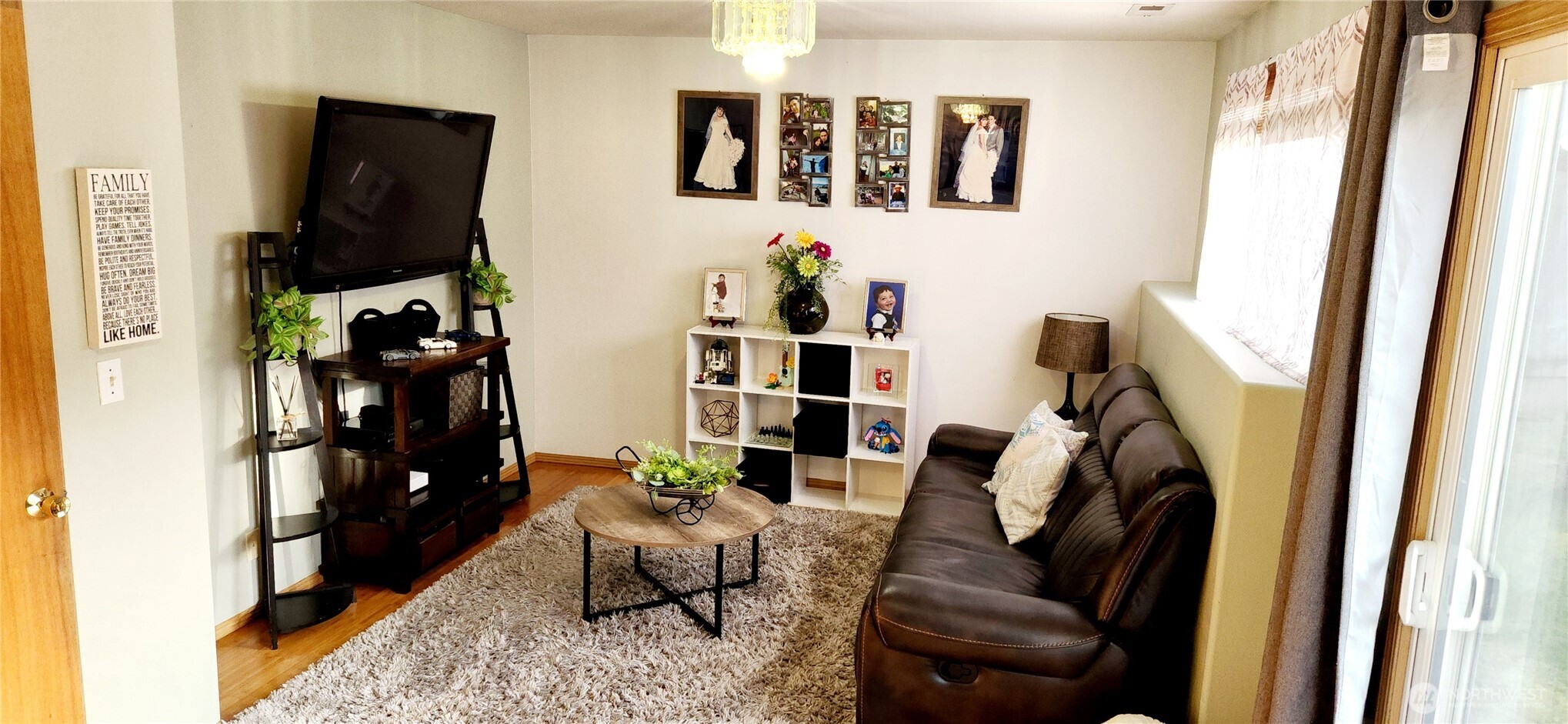 8902 West Mall Drive Everett, WA 98208 - Photo 15 of 23 a living room with furniture and floor to ceiling window