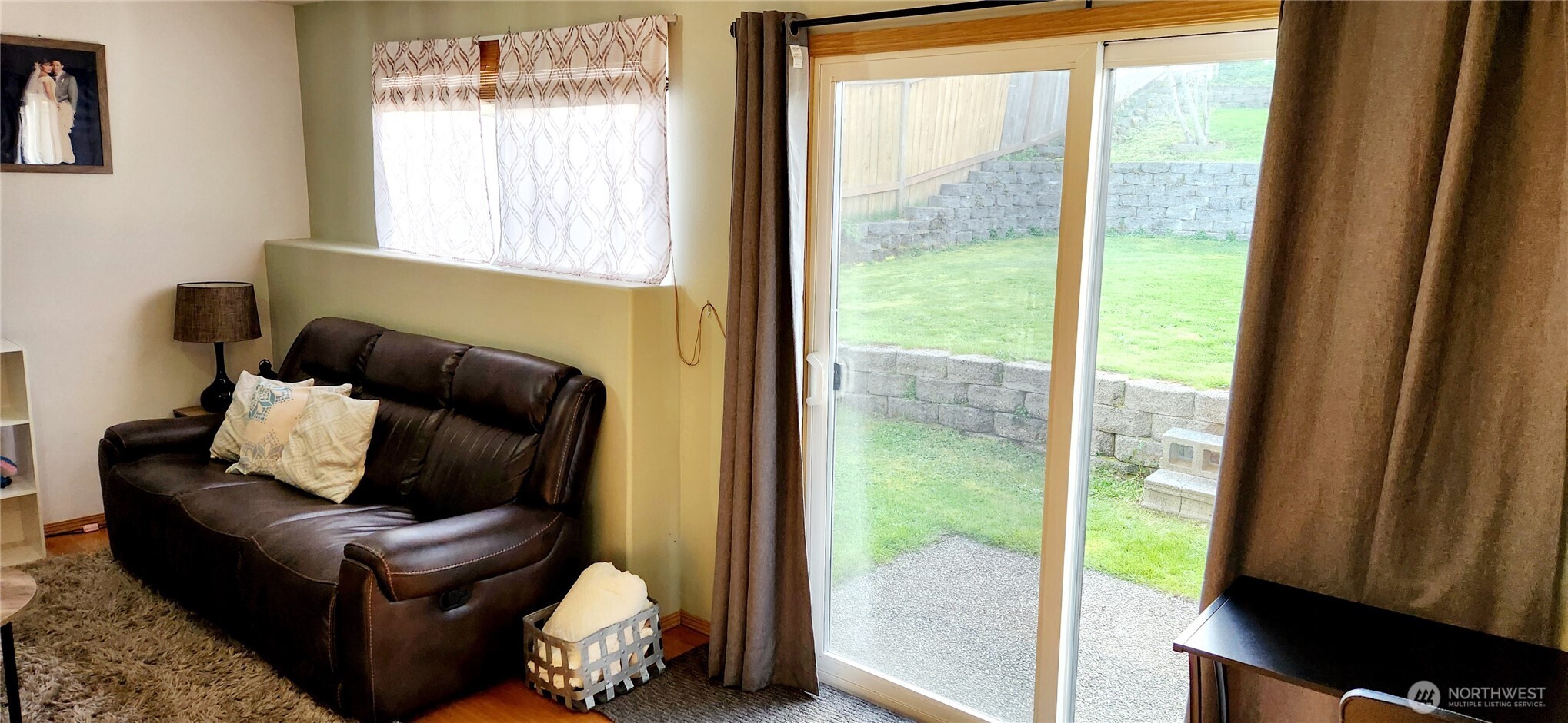 8902 West Mall Drive Everett, WA 98208 - Photo 16 of 23 a living room with furniture and a window