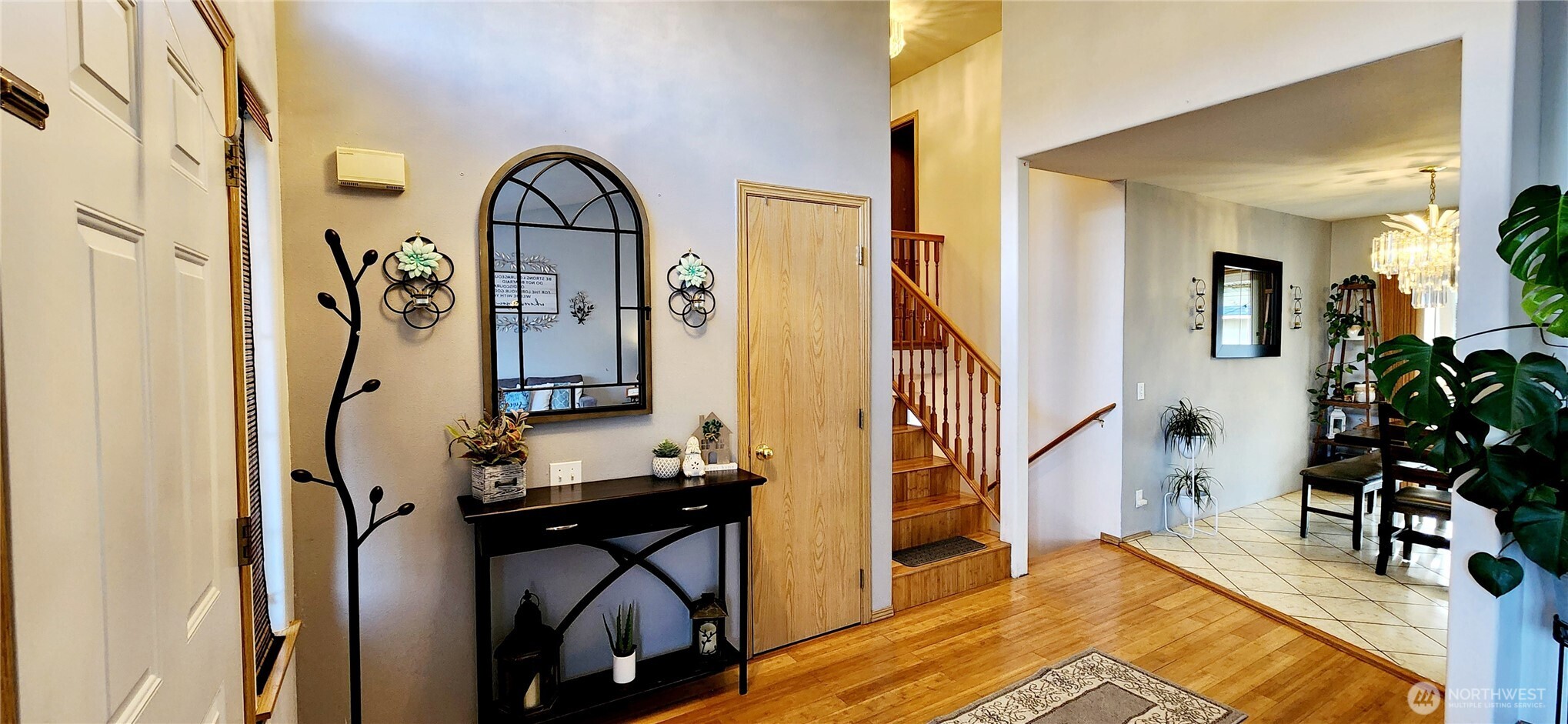 8902 West Mall Drive Everett, WA 98208 - Photo 3 of 23 a view of an entryway with wooden floor and furniture