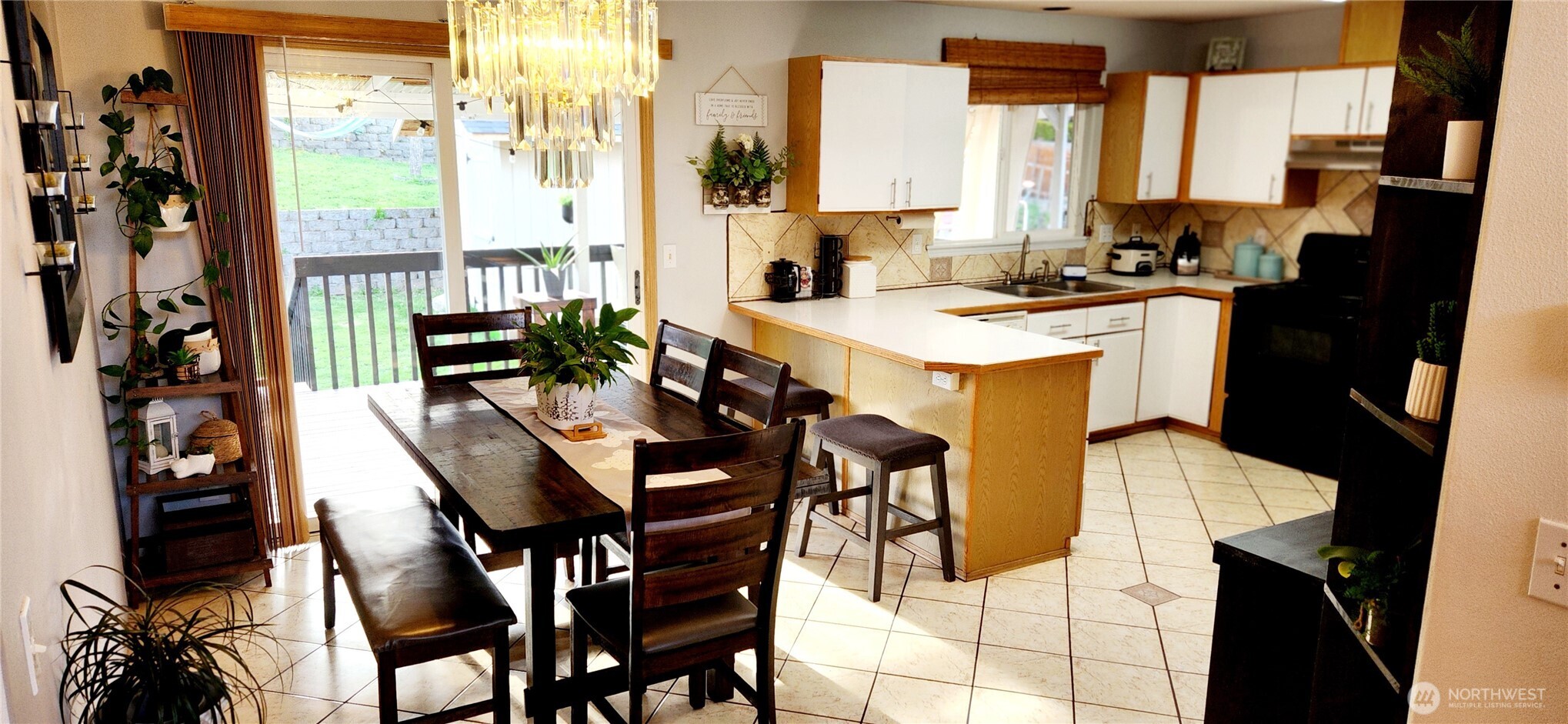 8902 West Mall Drive Everett, WA 98208 - Photo 6 of 23 a view of a dining room with furniture and window