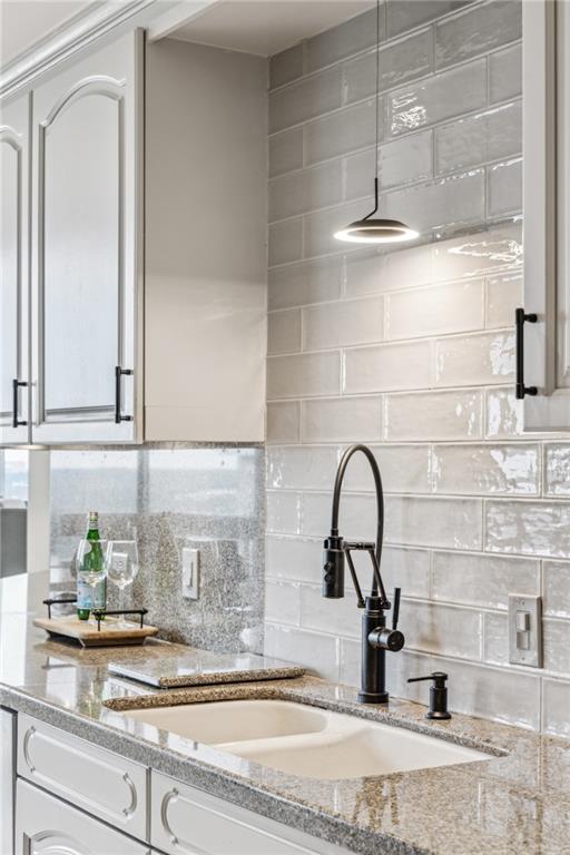 2660 Peachtree Road Northwest, Unit 23A Atlanta, GA 30305 - Photo 17 of 56 a bathroom with a sink and a mirror