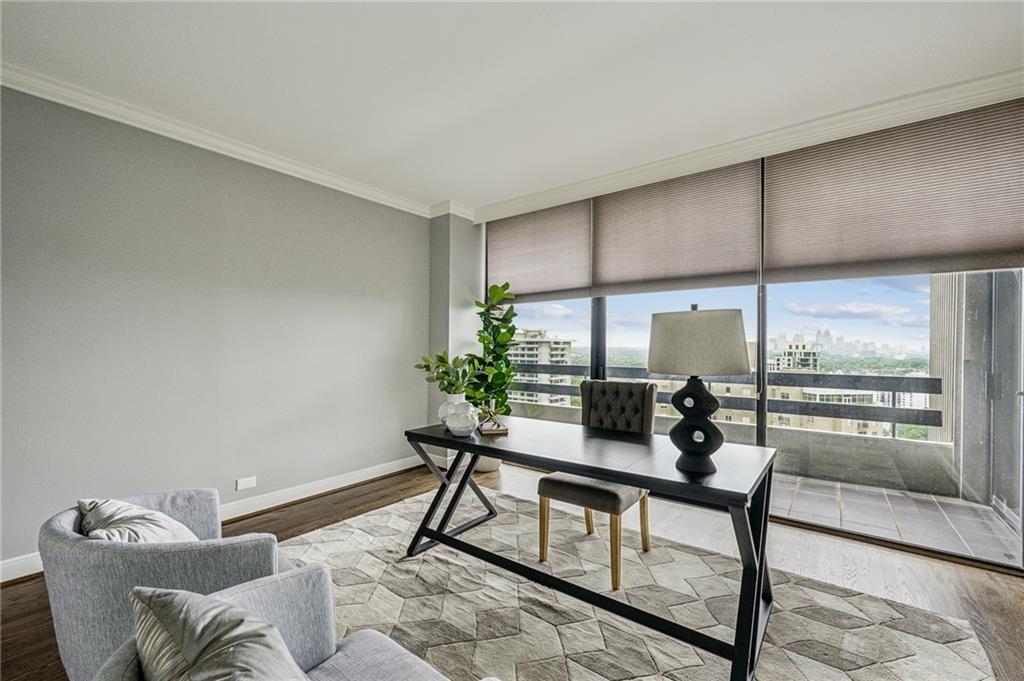2660 Peachtree Road Northwest, Unit 23A Atlanta, GA 30305 - Photo 36 of 56 a living room with furniture