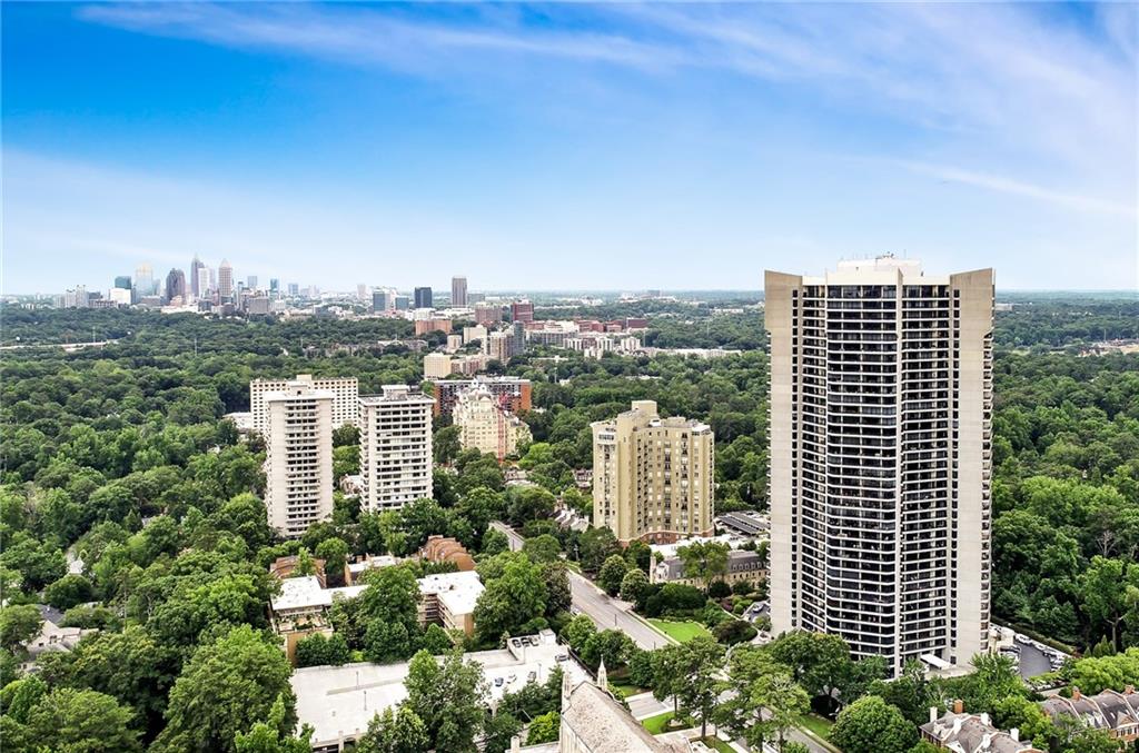 2660 Peachtree Road Northwest, Unit 23A Atlanta, GA 30305 - Photo 47 of 56 a view of a city with tall buildings in the background