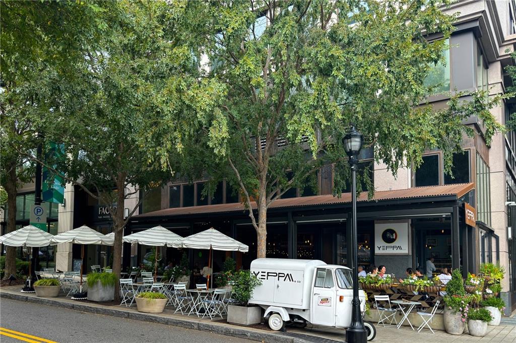 2660 Peachtree Road Northwest, Unit 23A Atlanta, GA 30305 - Photo 53 of 56 a car parked in front of a house