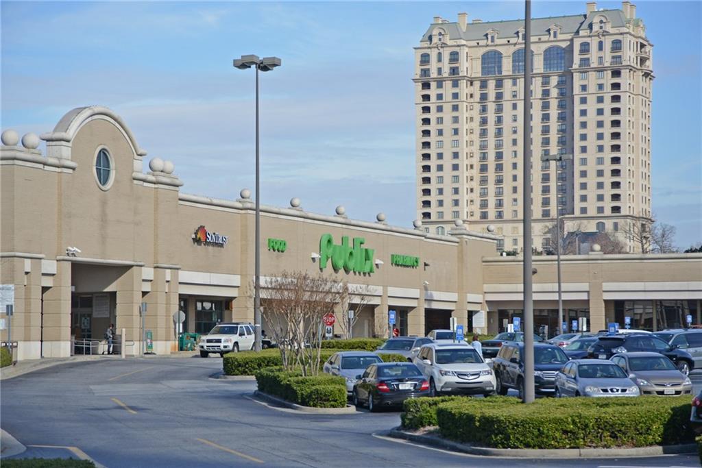 2660 Peachtree Road Northwest, Unit 23A Atlanta, GA 30305 - Photo 56 of 56 a front view of building with with a garden