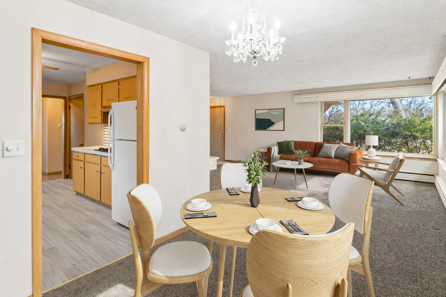 938 Hillcrest Road Elgin, IL 60123 - Photo 6 of 24 a dining room with furniture a livingroom view and wooden floor