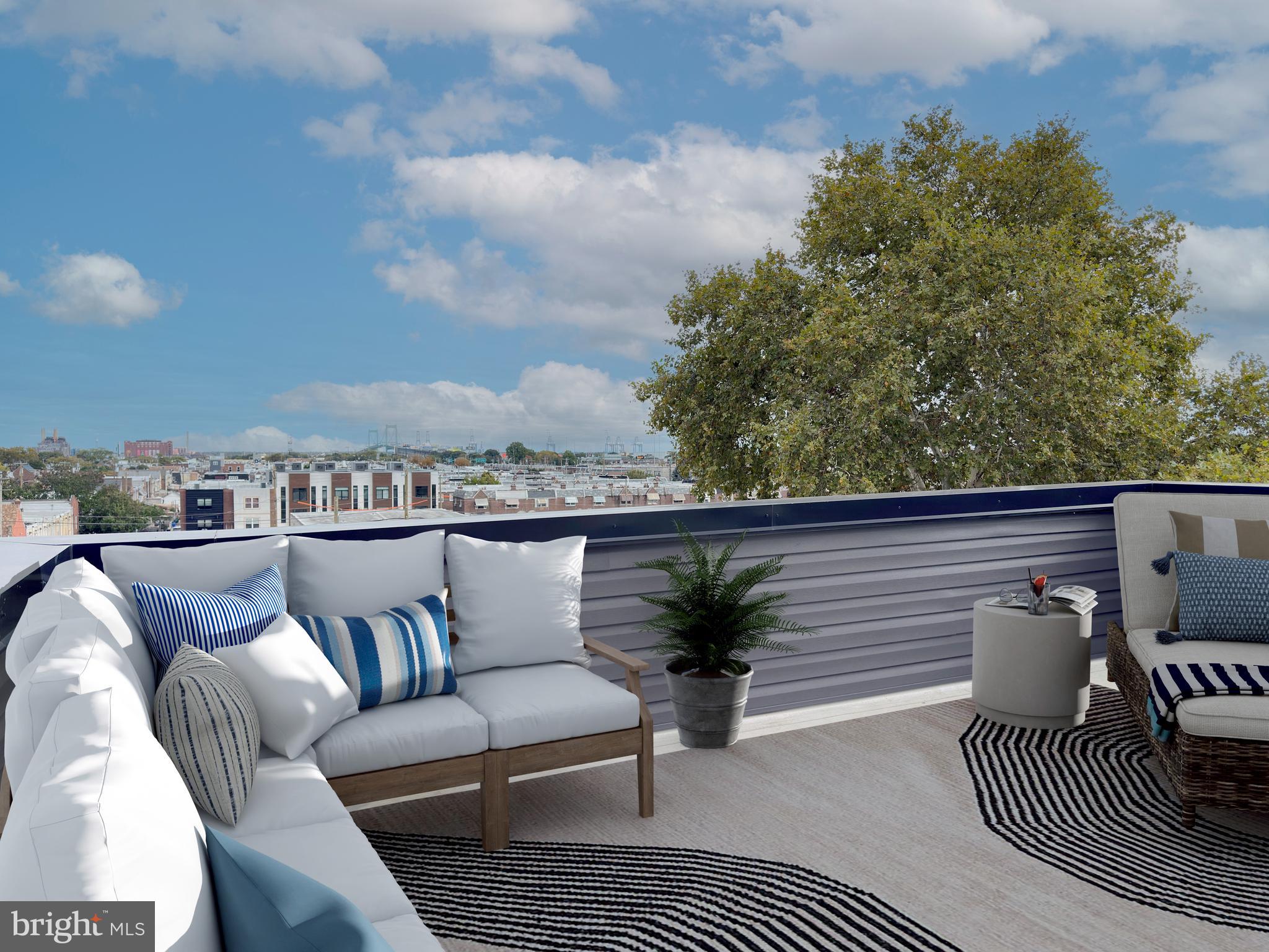 2809 South Warnock Street Philadelphia, PA 19148 - Photo 16 of 17 a balcony with furniture and rug