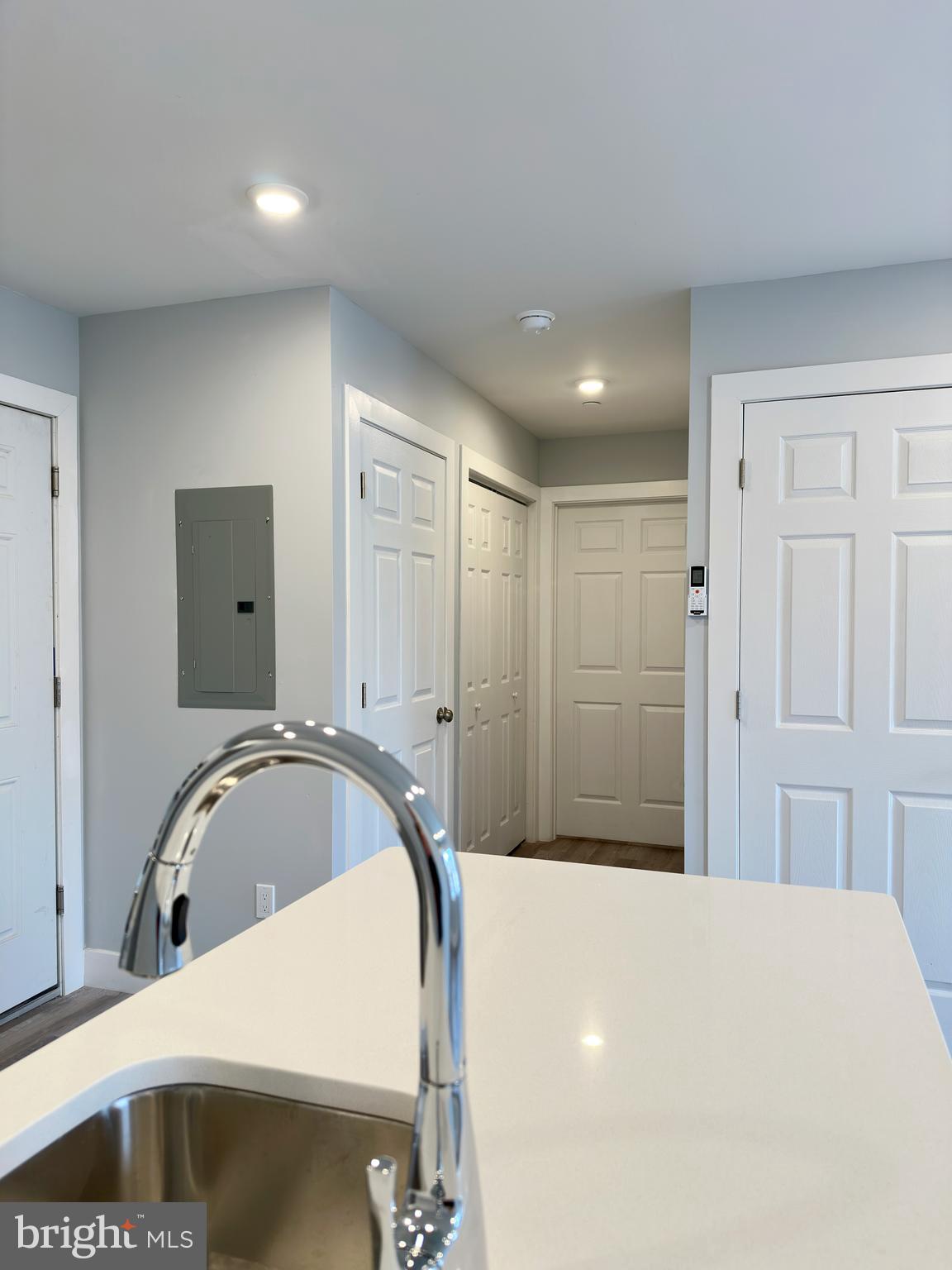 2809 South Warnock Street Philadelphia, PA 19148 - Photo 8 of 17 a bedroom with a bed and a mirror