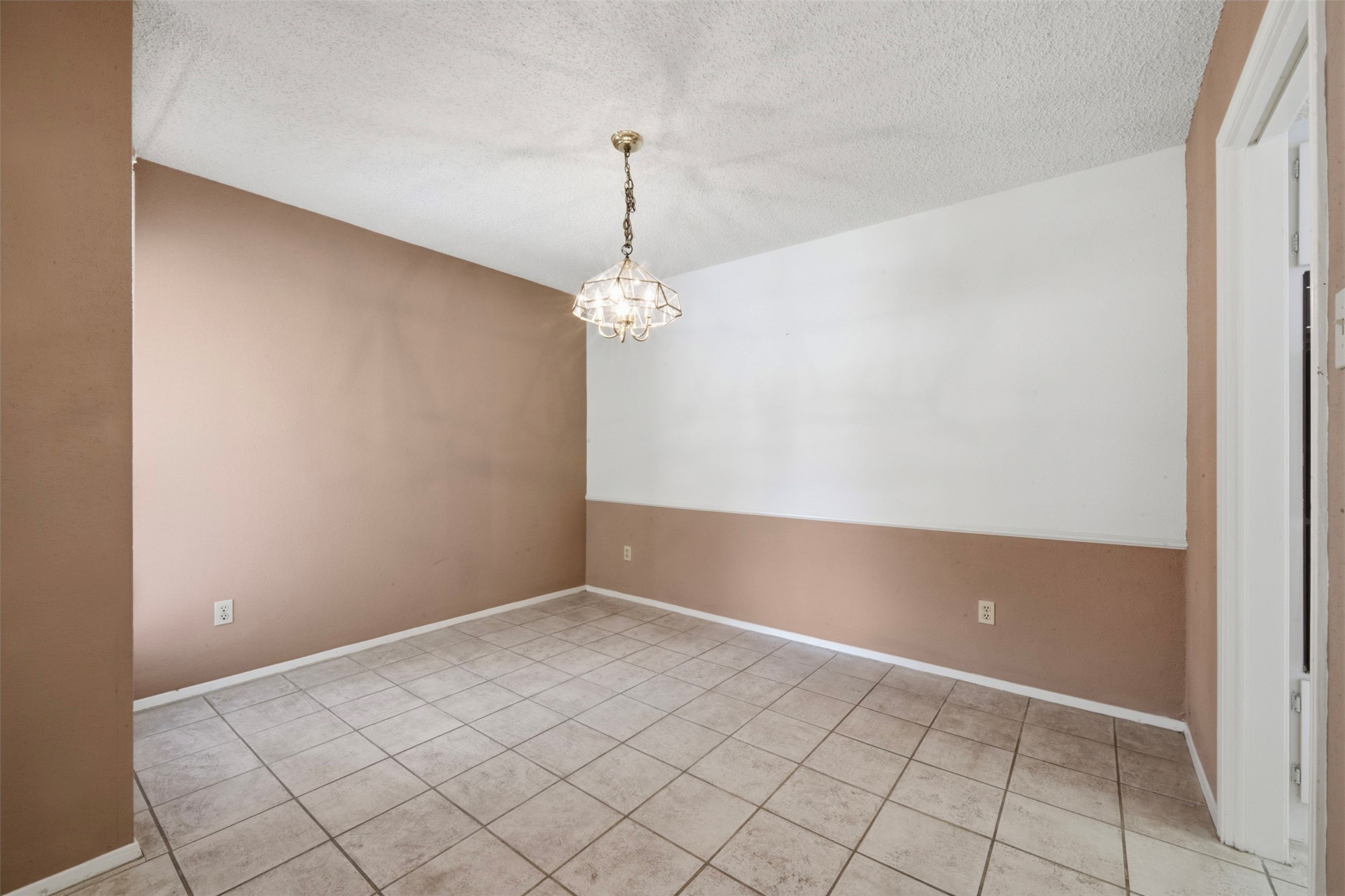 4019 Postwood Drive Spring, TX 77388 - Photo 8 of 50 an empty room with chandelier fan