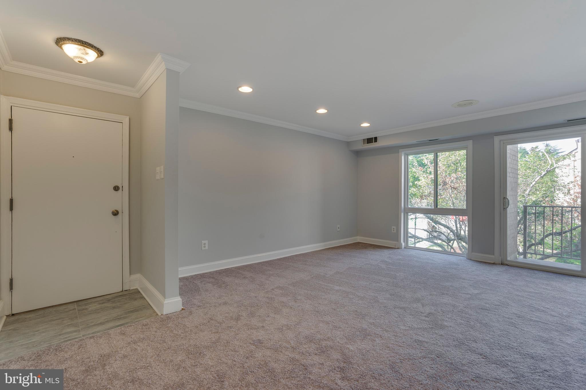 6141 Edsall Road, Unit H Alexandria, VA 22304 - Photo 12 of 29 an empty room with windows