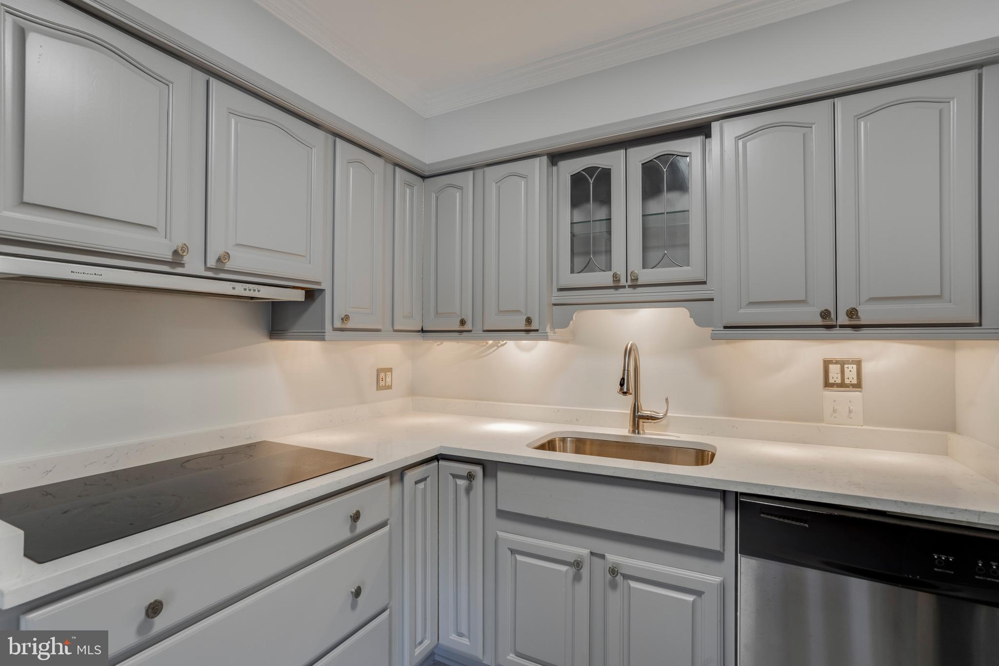 6141 Edsall Road, Unit H Alexandria, VA 22304 - Photo 16 of 29 a kitchen with stainless steel appliances granite countertop white cabinets sink and dishwasher