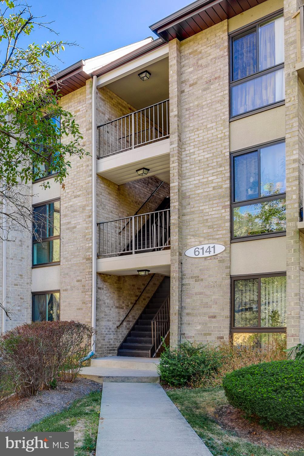 6141 Edsall Road, Unit H Alexandria, VA 22304 - Photo 3 of 29 a front view of a house with a yard