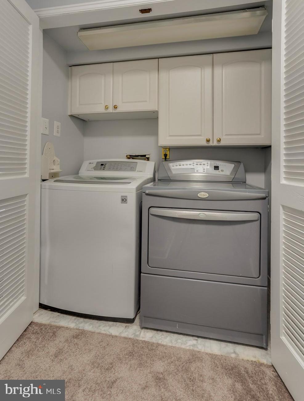 6141 Edsall Road, Unit H Alexandria, VA 22304 - Photo 24 of 29 a utility room with dryer and washer