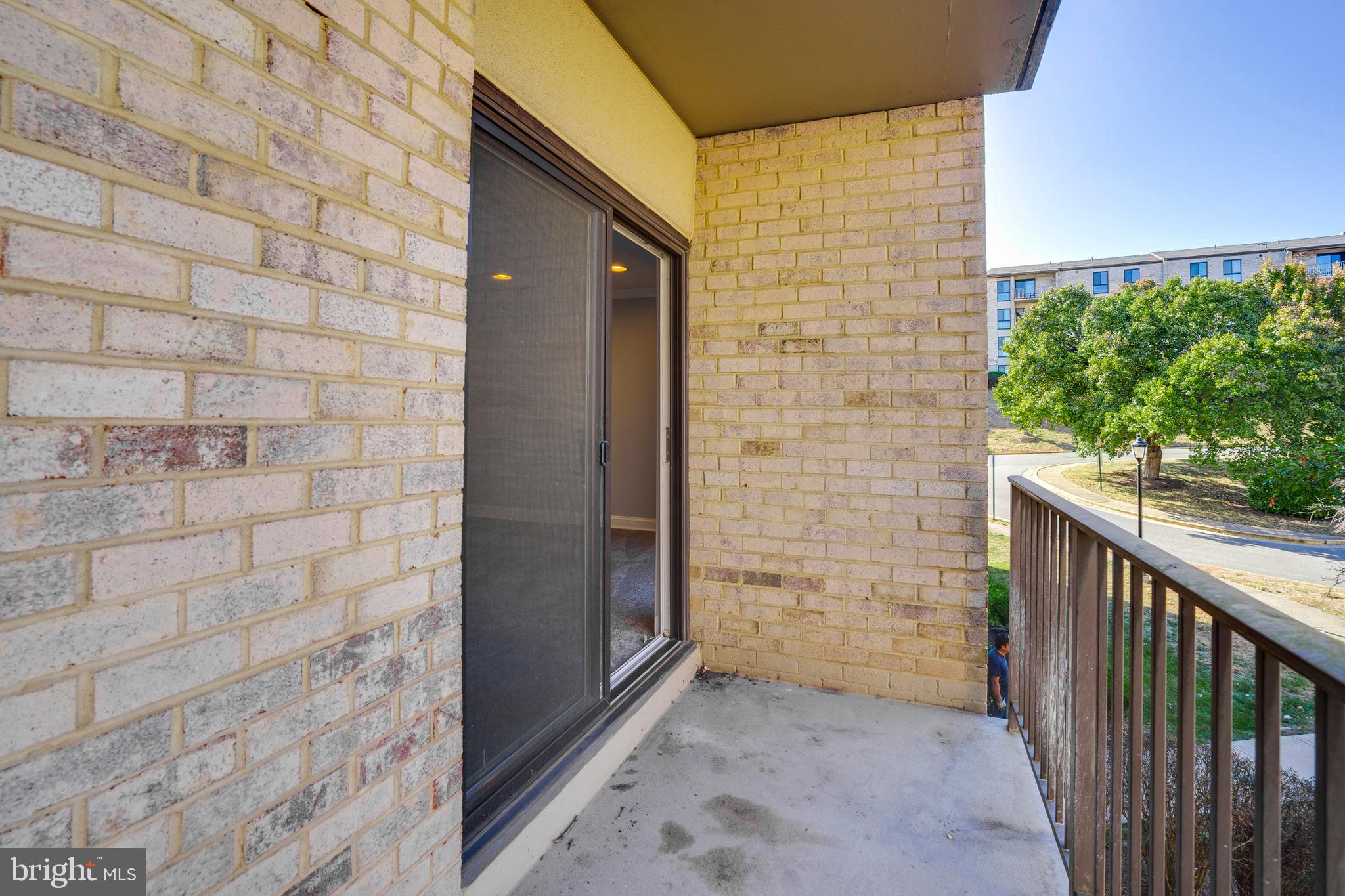 6141 Edsall Road, Unit H Alexandria, VA 22304 - Photo 27 of 29 a view of a brick wall of the house