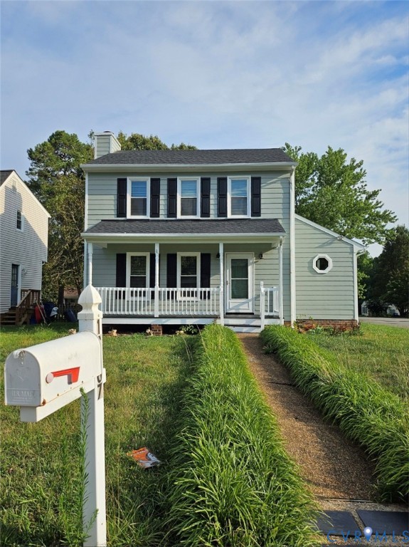 a house view with a garden space