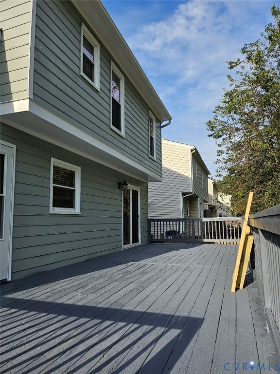 13607 Danwoods Road Midlothian, VA 23113 - Photo 14 of 14 a view of a house with wooden deck