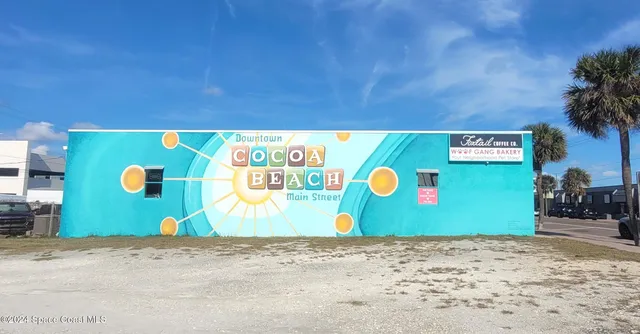 a view of a brick building with a large windows