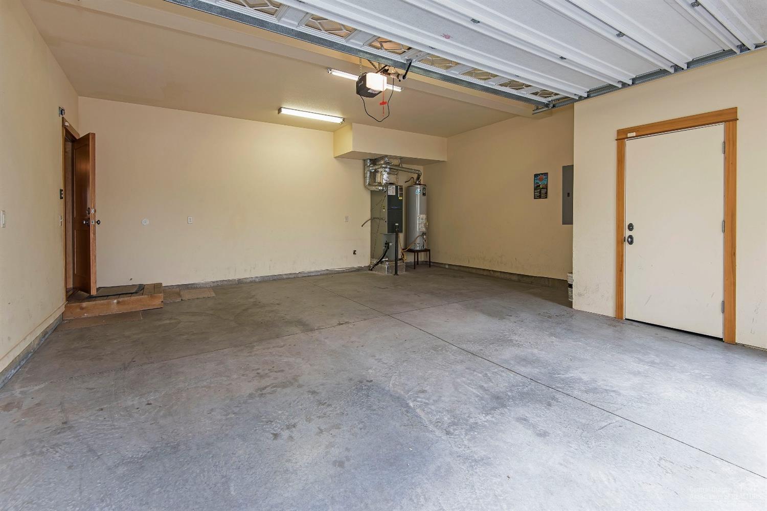 57166 Evergreen Loop Sunriver, OR 97707 - Photo 17 of 19 Spacious two-car attached garage offers