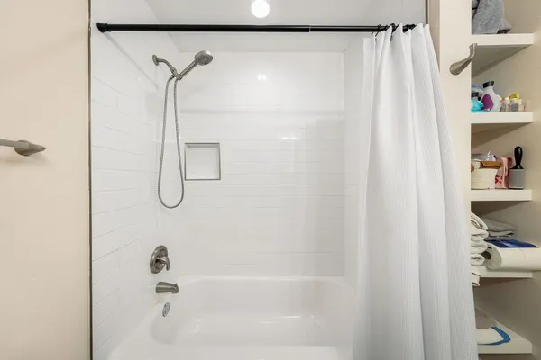 a close view of a bathtub in bathroom