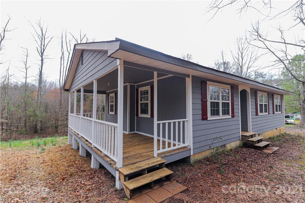 1731 Tradesville Road, Unit 5 Lancaster, SC 29720 - Photo 3 of 25 a view of a house with a yard and wooden deck