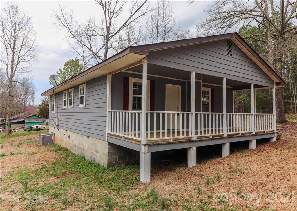 1731 Tradesville Road, Unit 5 Lancaster, SC 29720 - Photo 22 of 25 a view of a house with a yard and deck