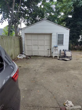 a view of a house with a garage