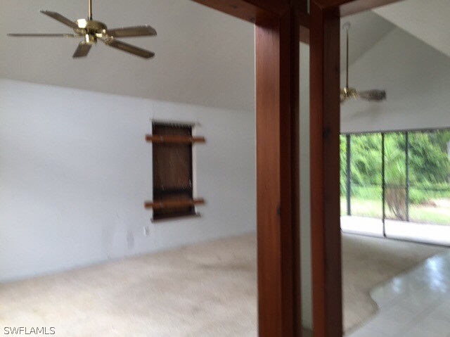 18312 Lee Road Fort Myers, FL 33967 - Photo 5 of 16 a view of an empty room with a window