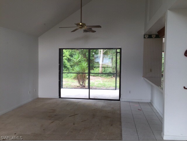 18312 Lee Road Fort Myers, FL 33967 - Photo 7 of 16 a view of an empty room with a window