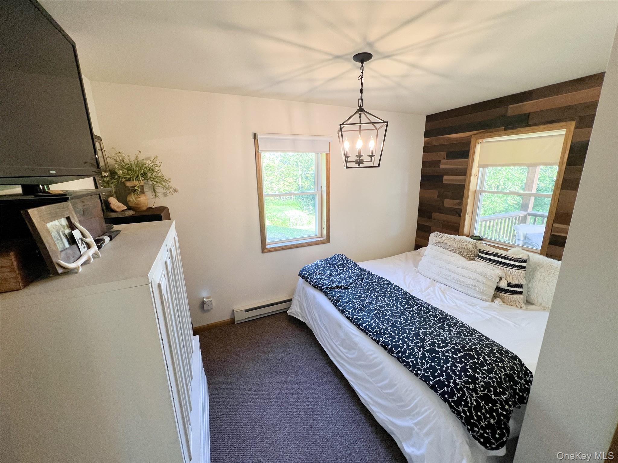 295 Emerald Heights Road Delancey, NY 13752 - Photo 18 of 30 Accent wall featuring wood paneling