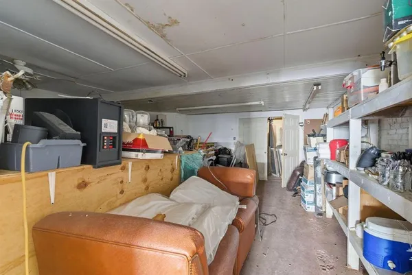 a bed room with a bed and a gym