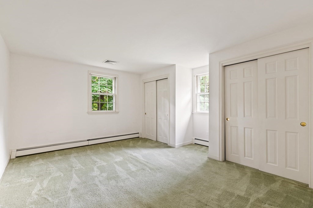 29 Saddle Club Road Lexington, MA 02420 - Photo 16 of 22 an empty room with windows