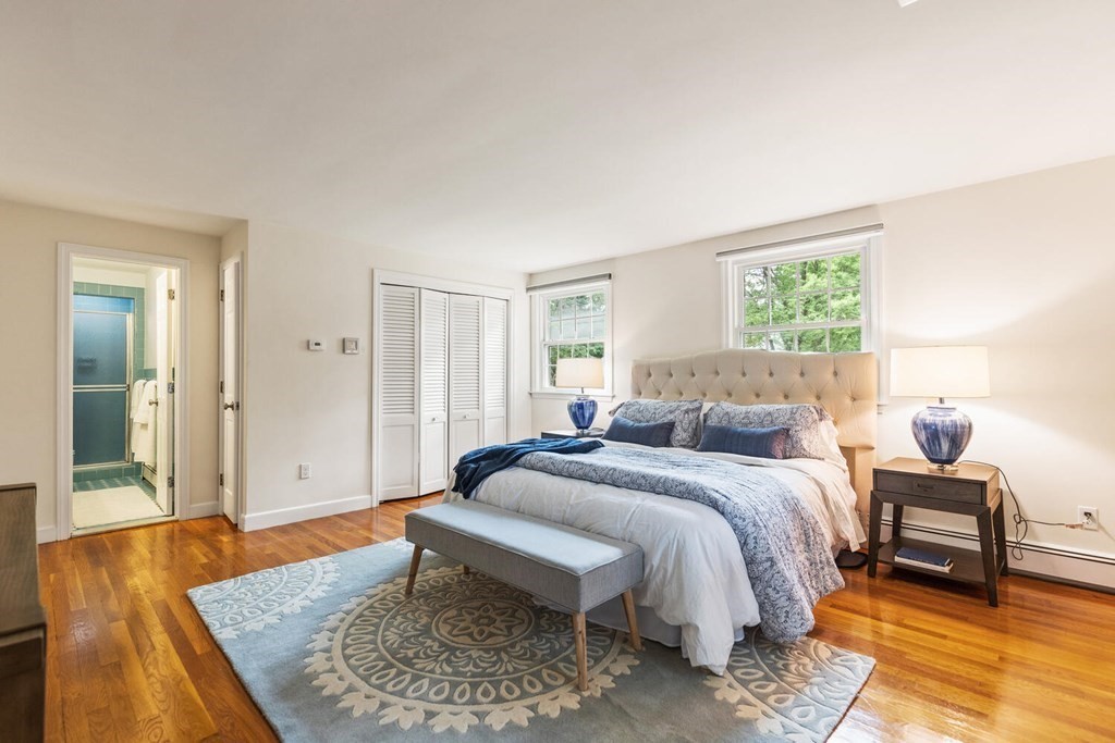 29 Saddle Club Road Lexington, MA 02420 - Photo 18 of 22 a bed room with a bed and a couch