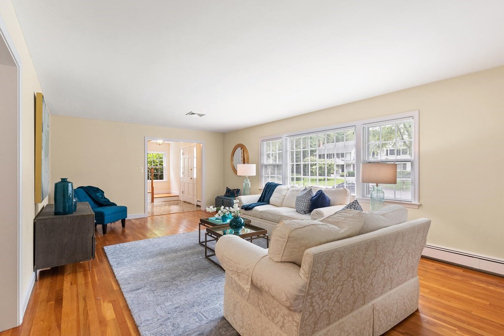29 Saddle Club Road Lexington, MA 02420 - Photo 2 of 22 a living room with furniture and a large window