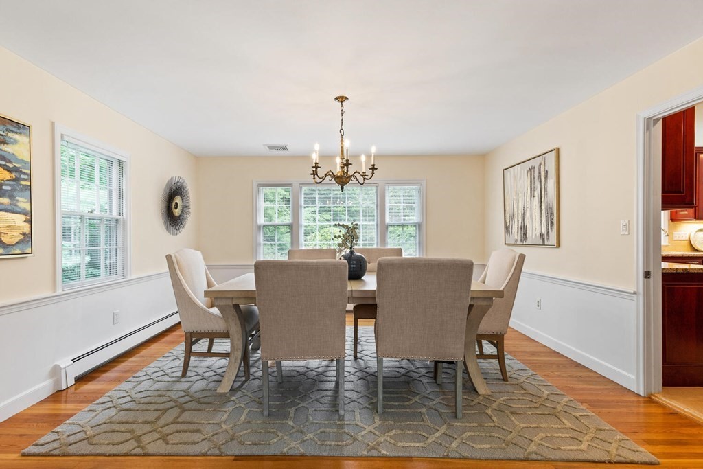 29 Saddle Club Road Lexington, MA 02420 - Photo 4 of 22 a view of a dining room with furniture window and wooden floor