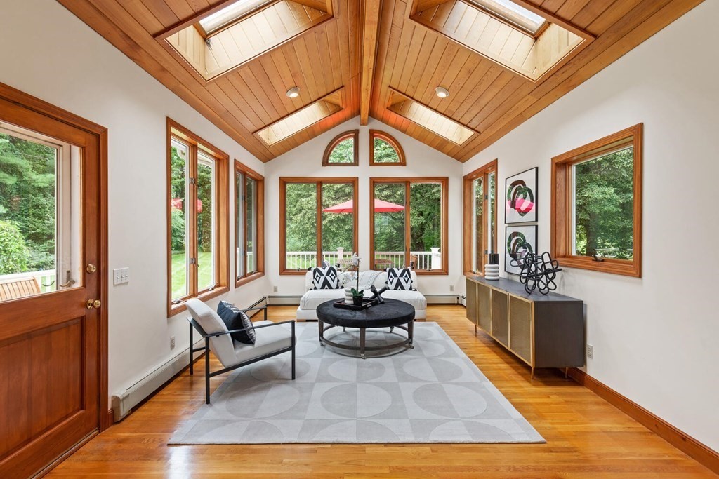 29 Saddle Club Road Lexington, MA 02420 - Photo 10 of 22 a living room with furniture and large windows