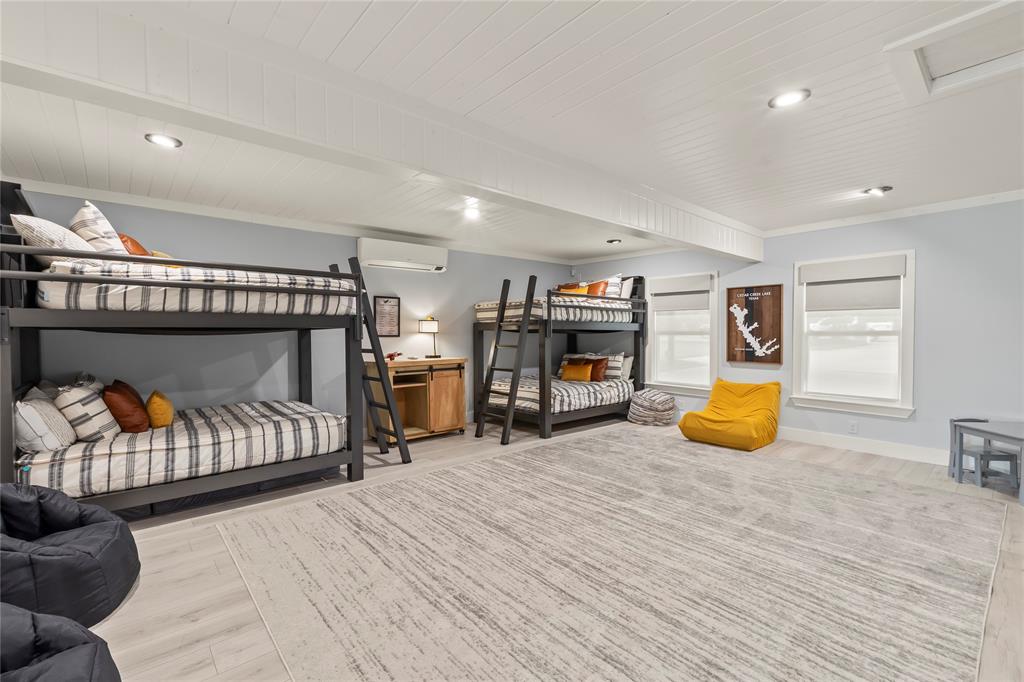 125 Xit Ranch Road Trinidad, TX 75163 - Photo 11 of 34 a bedroom with furniture and a couch