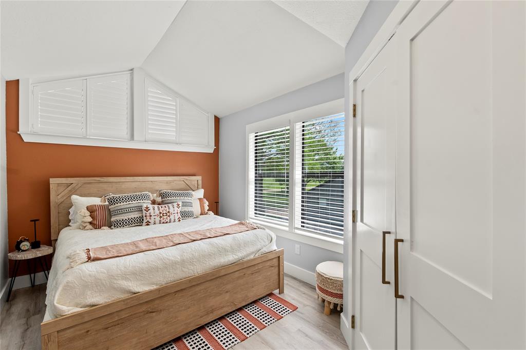 125 Xit Ranch Road Trinidad, TX 75163 - Photo 22 of 34 a bedroom with a bed and a window with outer view