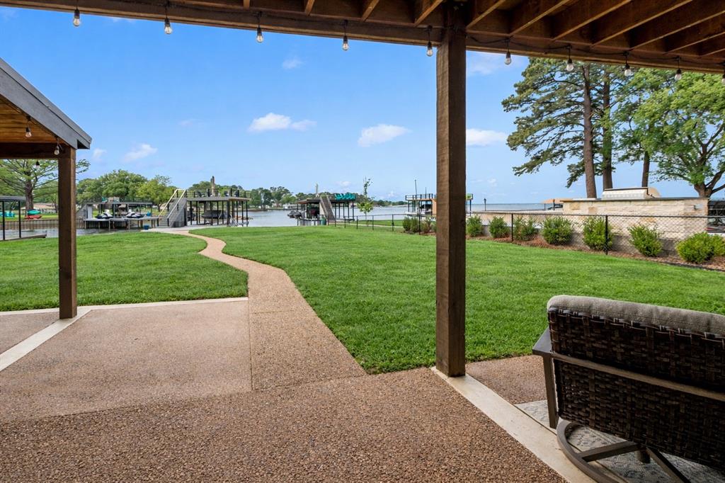 125 Xit Ranch Road Trinidad, TX 75163 - Photo 26 of 34 a view of a porch with furniture and garden