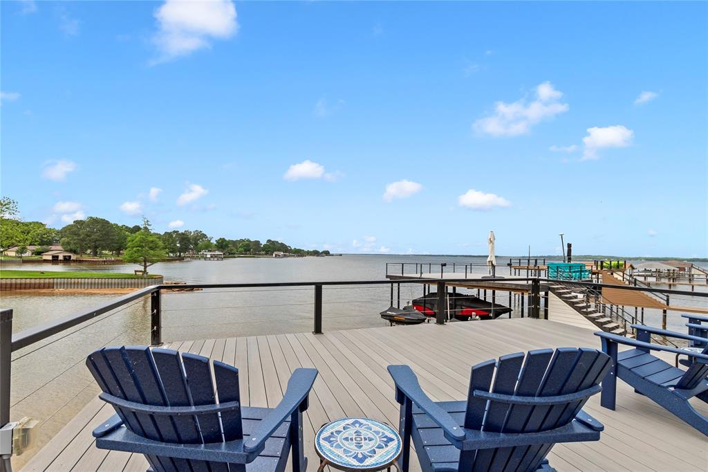 125 Xit Ranch Road Trinidad, TX 75163 - Photo 29 of 34 a view of a balcony with table and chairs