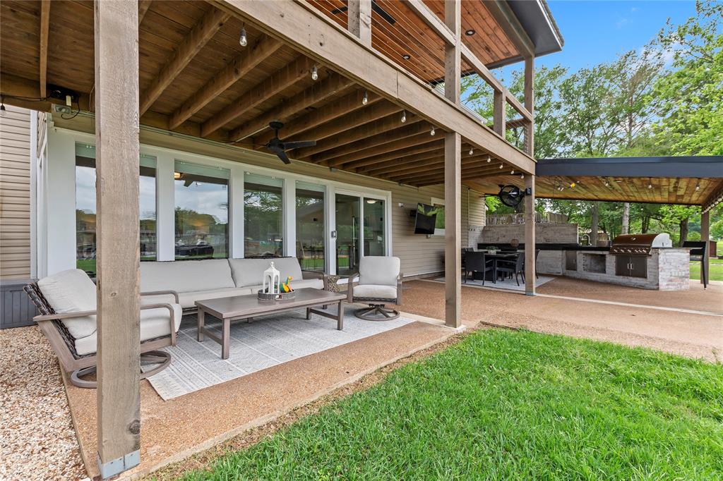 125 Xit Ranch Road Trinidad, TX 75163 - Photo 3 of 34 a view of a patio with table and chairs and potted plants