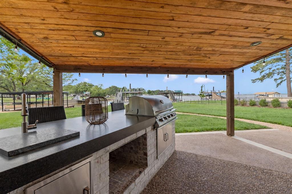 125 Xit Ranch Road Trinidad, TX 75163 - Photo 4 of 34 a kitchen with a sink and a stove
