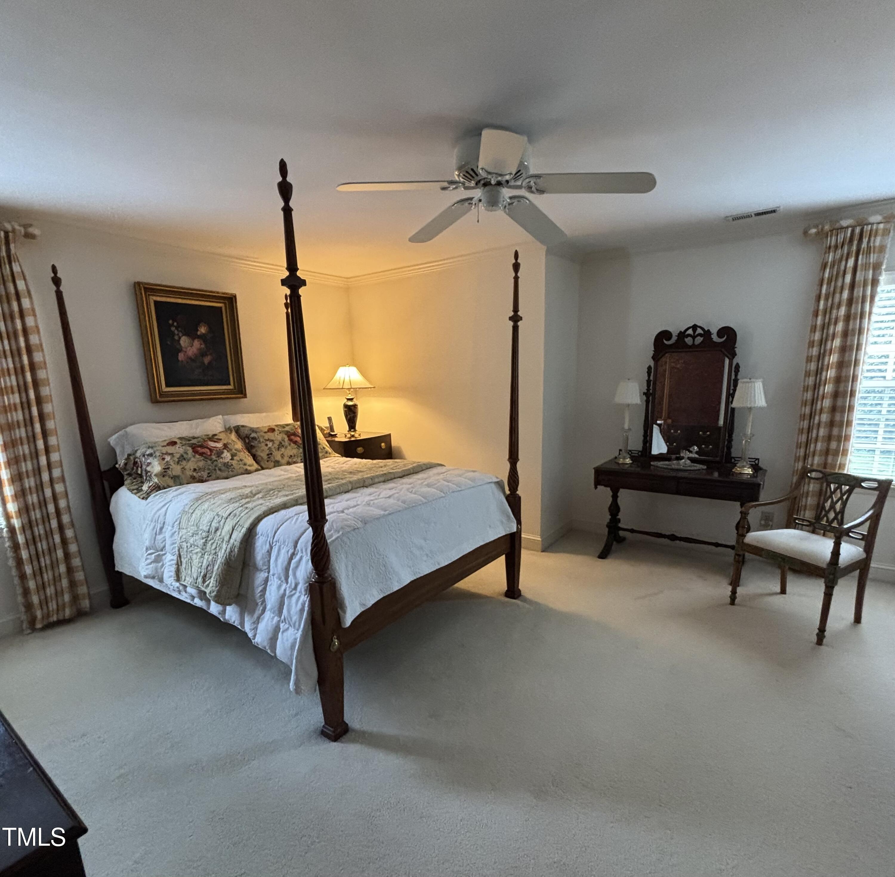 9301 Brookton Court Raleigh, NC 27615 - Photo 21 of 29 a bedroom with a bed and a desk