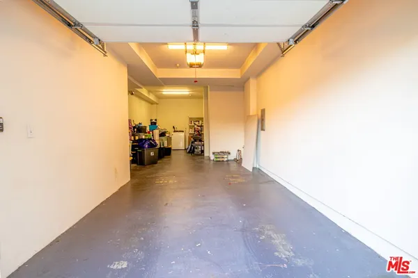 a view of a hallway with a couch