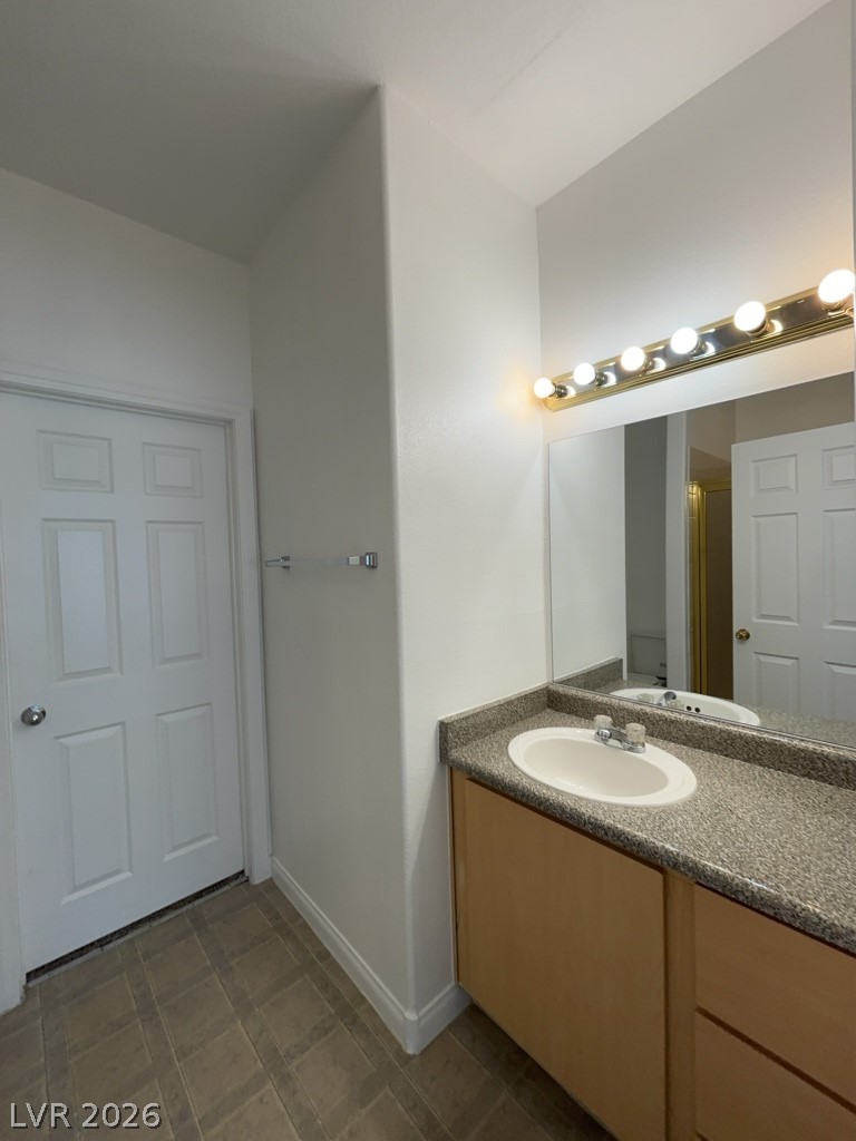 4915 East Russell Road, Unit 142 Las Vegas, NV 89120 - Photo 8 of 10 A well-appointed vanity with generous counter space awaits in this pristine bathroom.