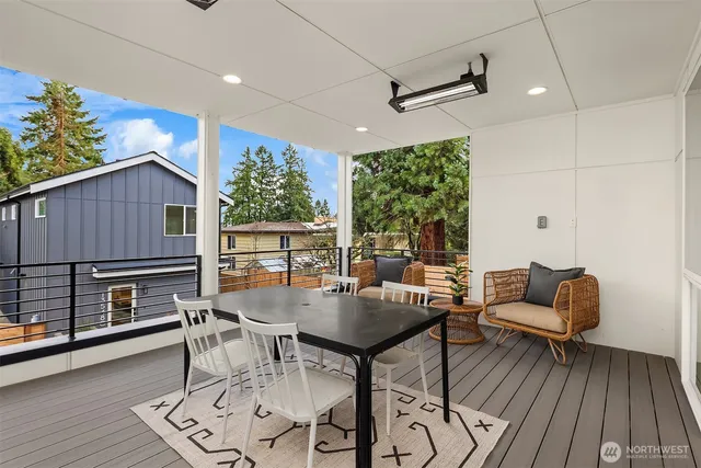 a view of a livingroom with furniture window and wooden floor