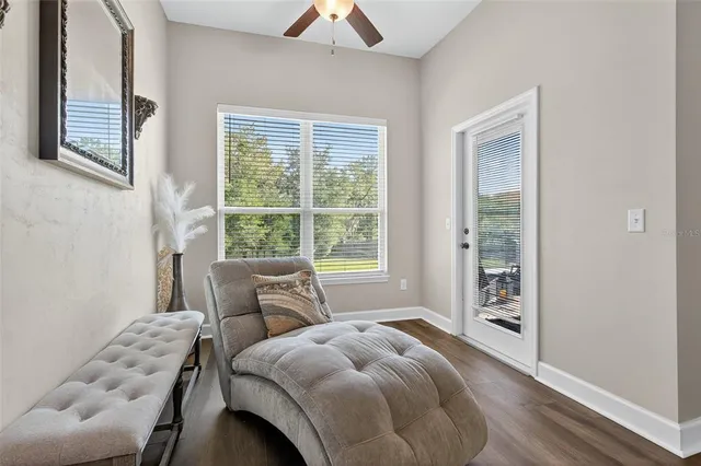 a bathroom with a tub and a window